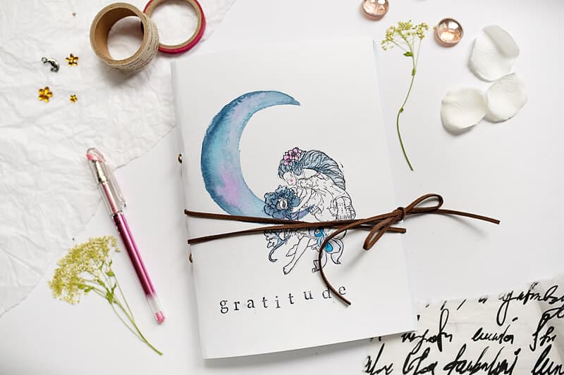 handmade gratitude journal on a table