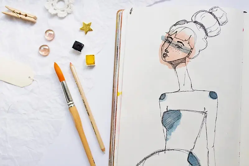 sketch of a girl in an art journal