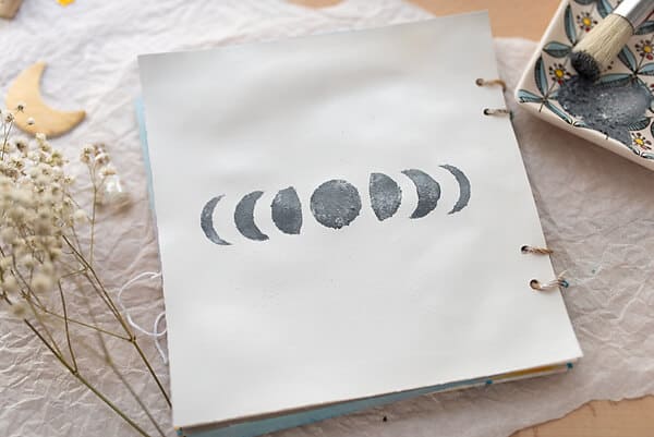 painted moon phases in journal