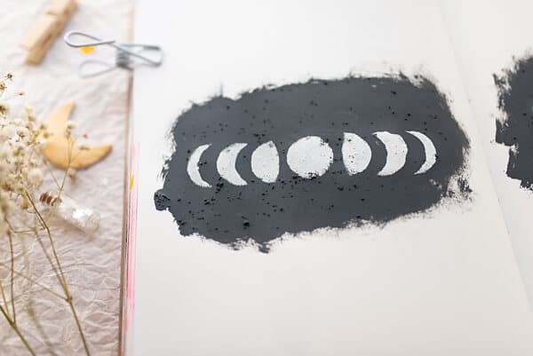 white moon phases on black gesso