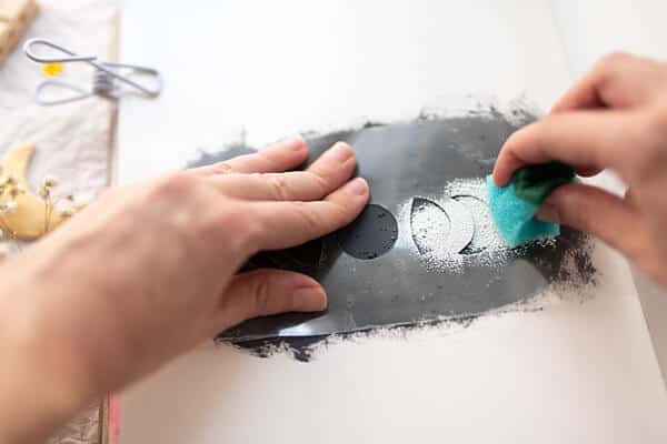 dabbing acrylic paint with a sponge art tool