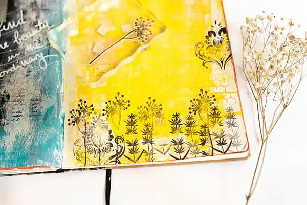 stamping on an art journal page