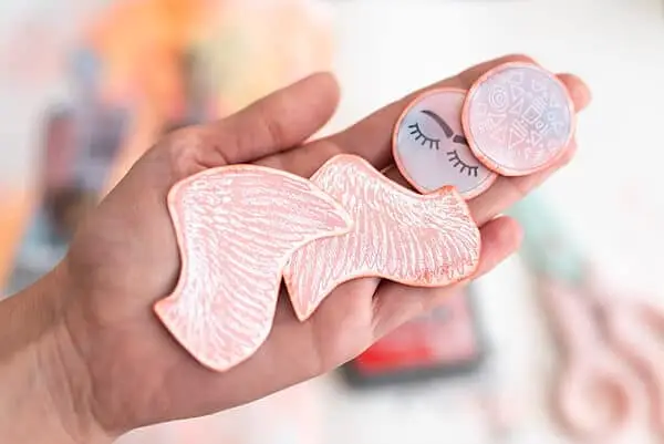 hand holding art journal stickers