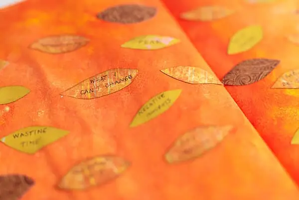 fall collaging with paper leaves