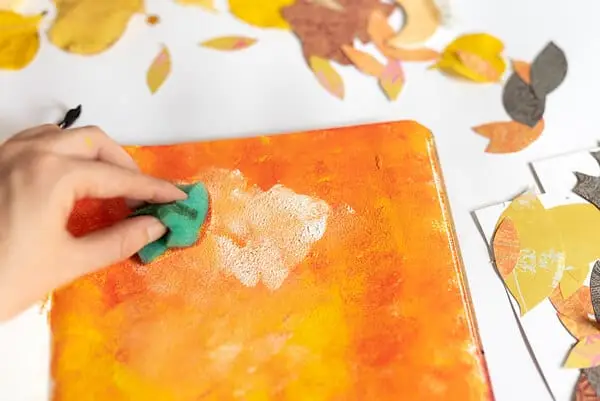 dabbing white acrylic with a sponge