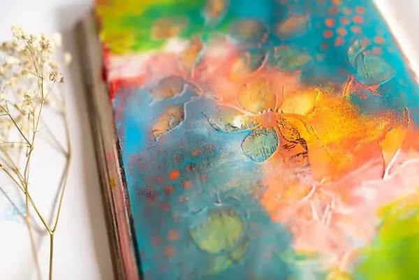 close-up of mixed media art journal page