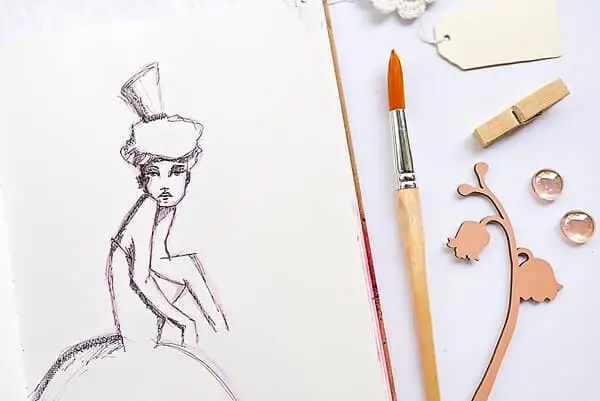 drawing of a girl with fountain pen