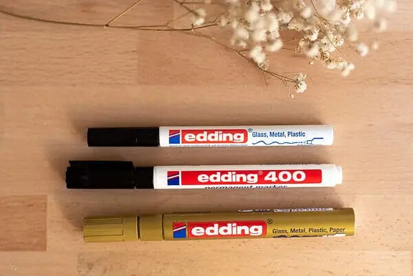 three edding markers