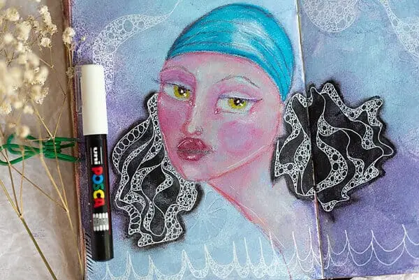 painting of a woman in an art journal