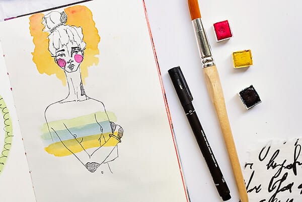 watercolor girl in an art journal