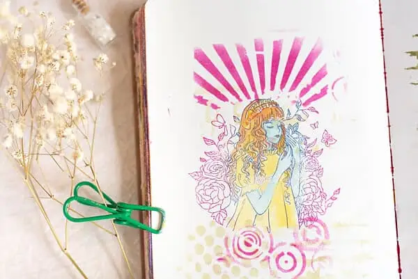 art journal page with a stamped girl