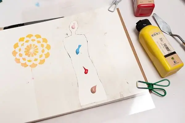 painting with acrylic paint, stencil and a palette knife