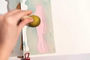 dabbing acrylic paint over a stencil