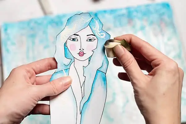 distressing a paper girl with sponge and ink