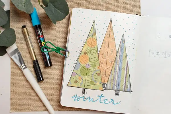winter trees on an art journal page