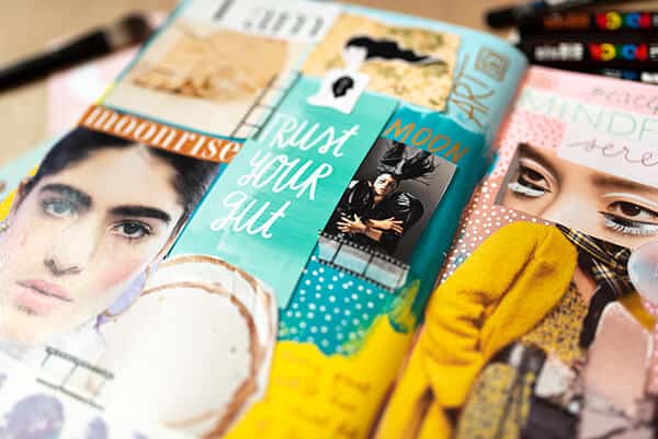 close-up of art journal inspiration board