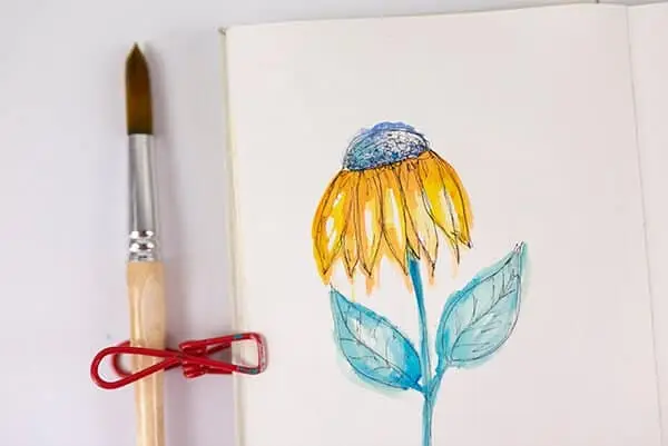 watercolor flower on art journal page