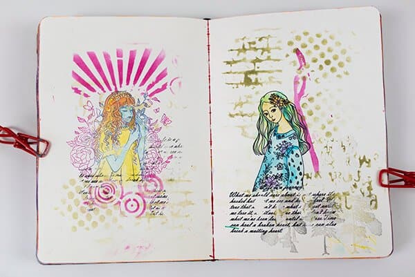 art journal spread with stamped images