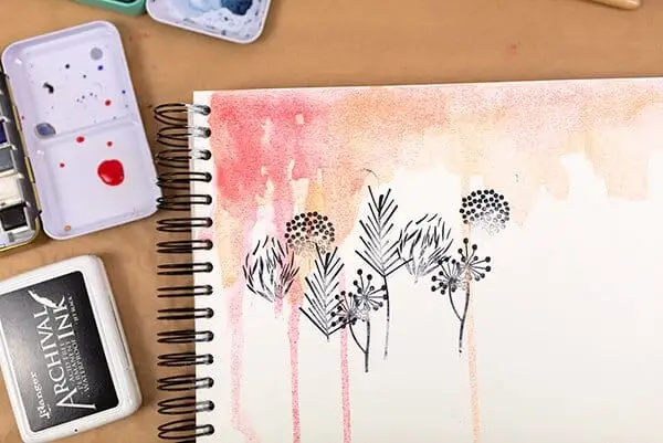 stamped flowers on watercolor