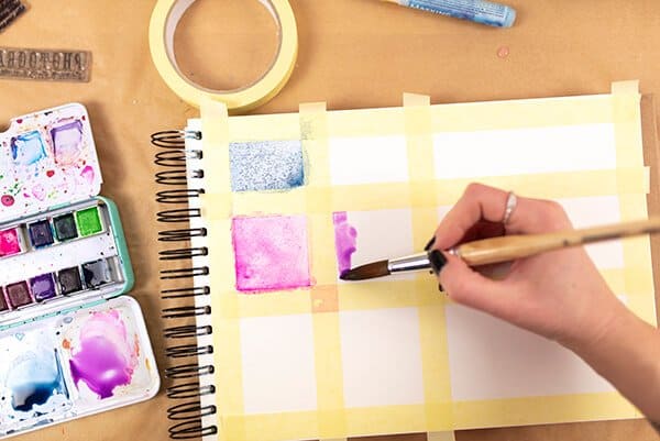 painting squares with watercolor