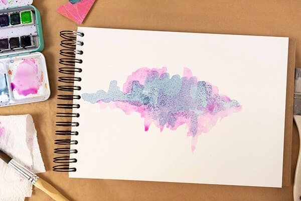 watercolor painting in an art journal