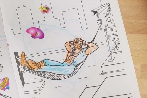 orange spiderman in a coloring book