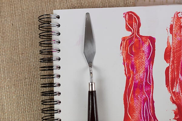 palette knife and an art journal