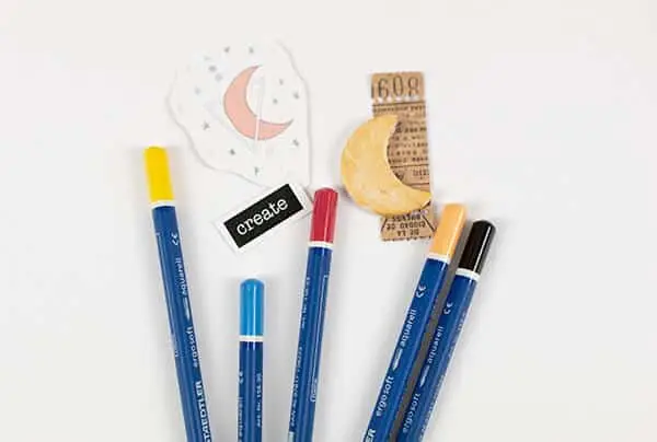 watercolor pencils on the table