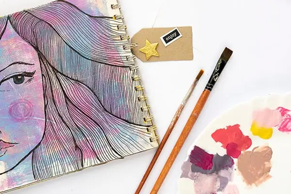 art journal and brushes