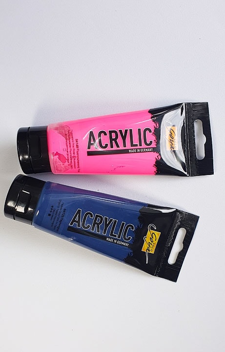 two tubes of acrylic paint