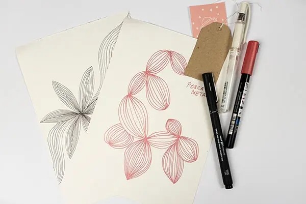 pens for doodling and white papers