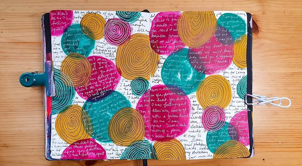 art journal spread with circles