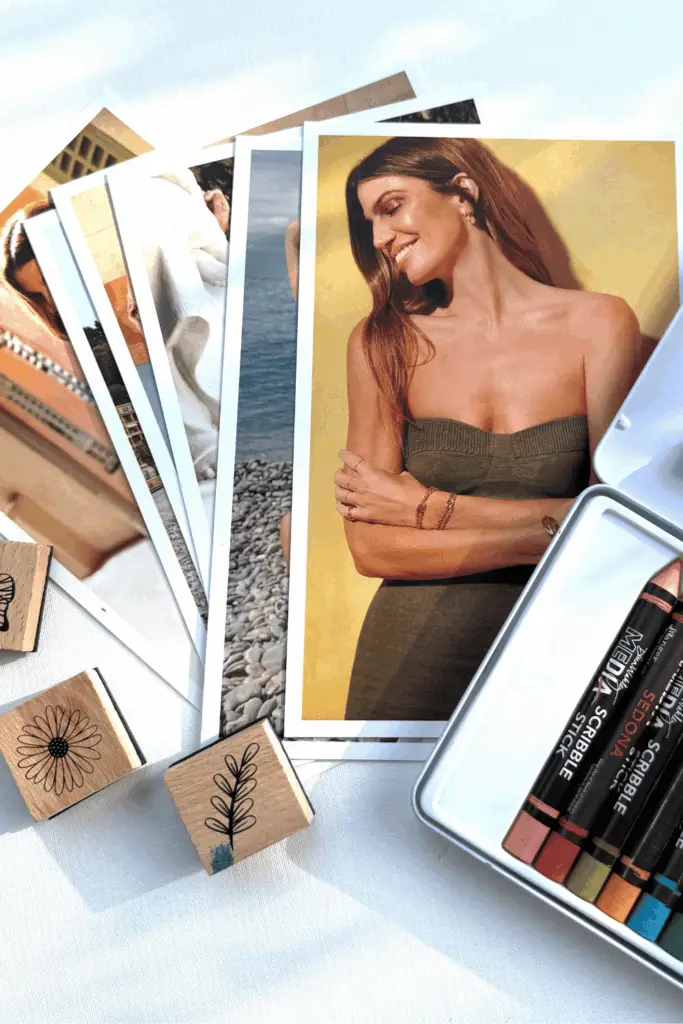 Art journal collage flat lay with portrait cutouts, stamps, and pastel colors for beginner mixed media projects.