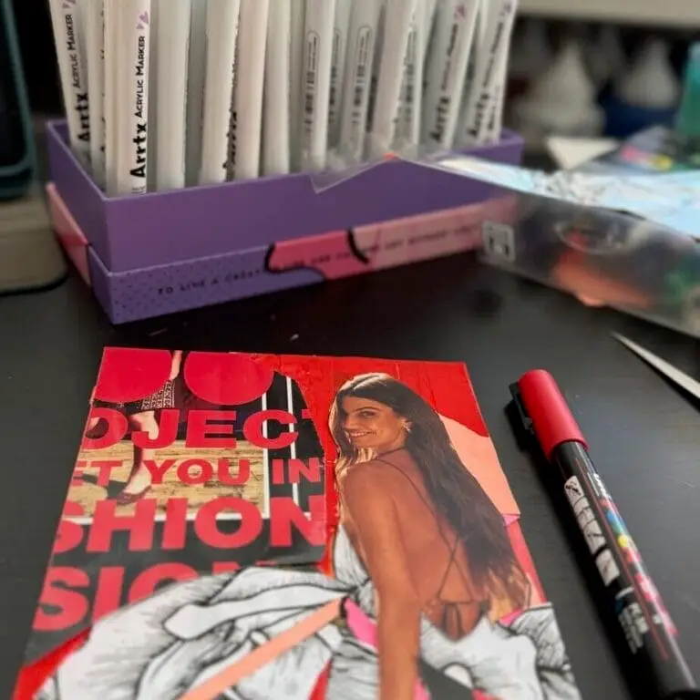 Finished easy collage idea for art journal with unified red tones and focal figure