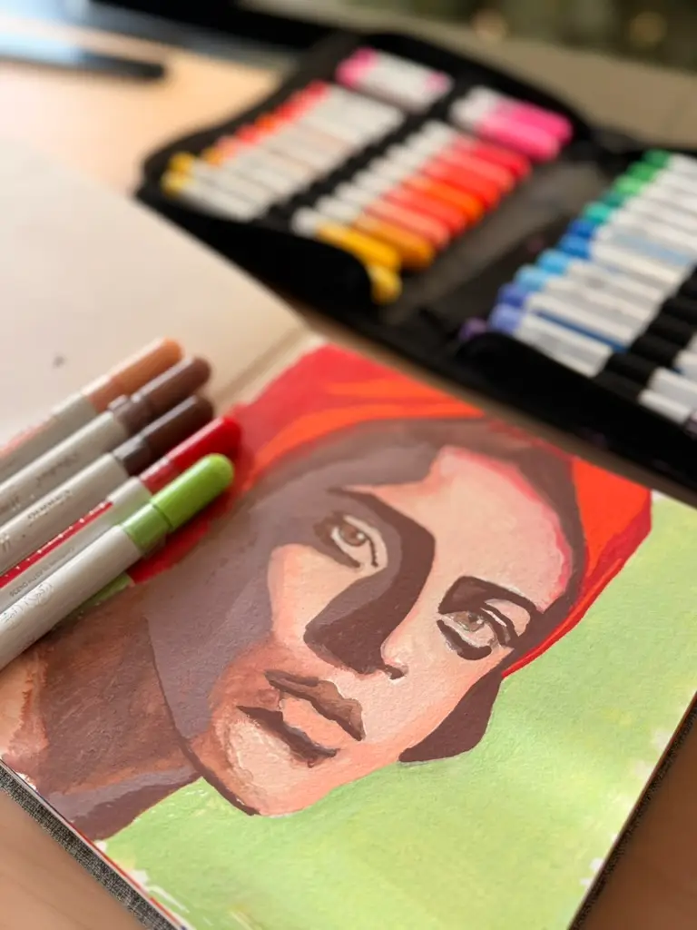 portrait using acrylic markers in an art journal