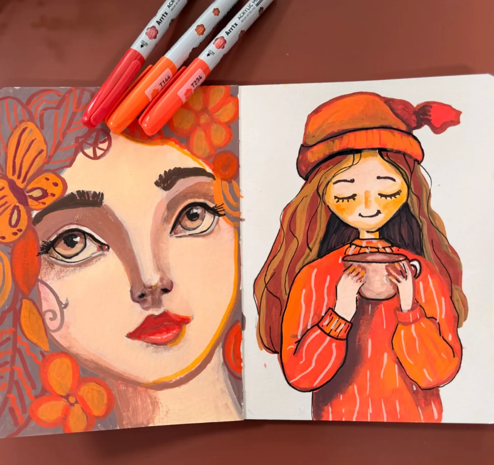 art journal with two pages one a fall whimsical face and the other a whimsical doll