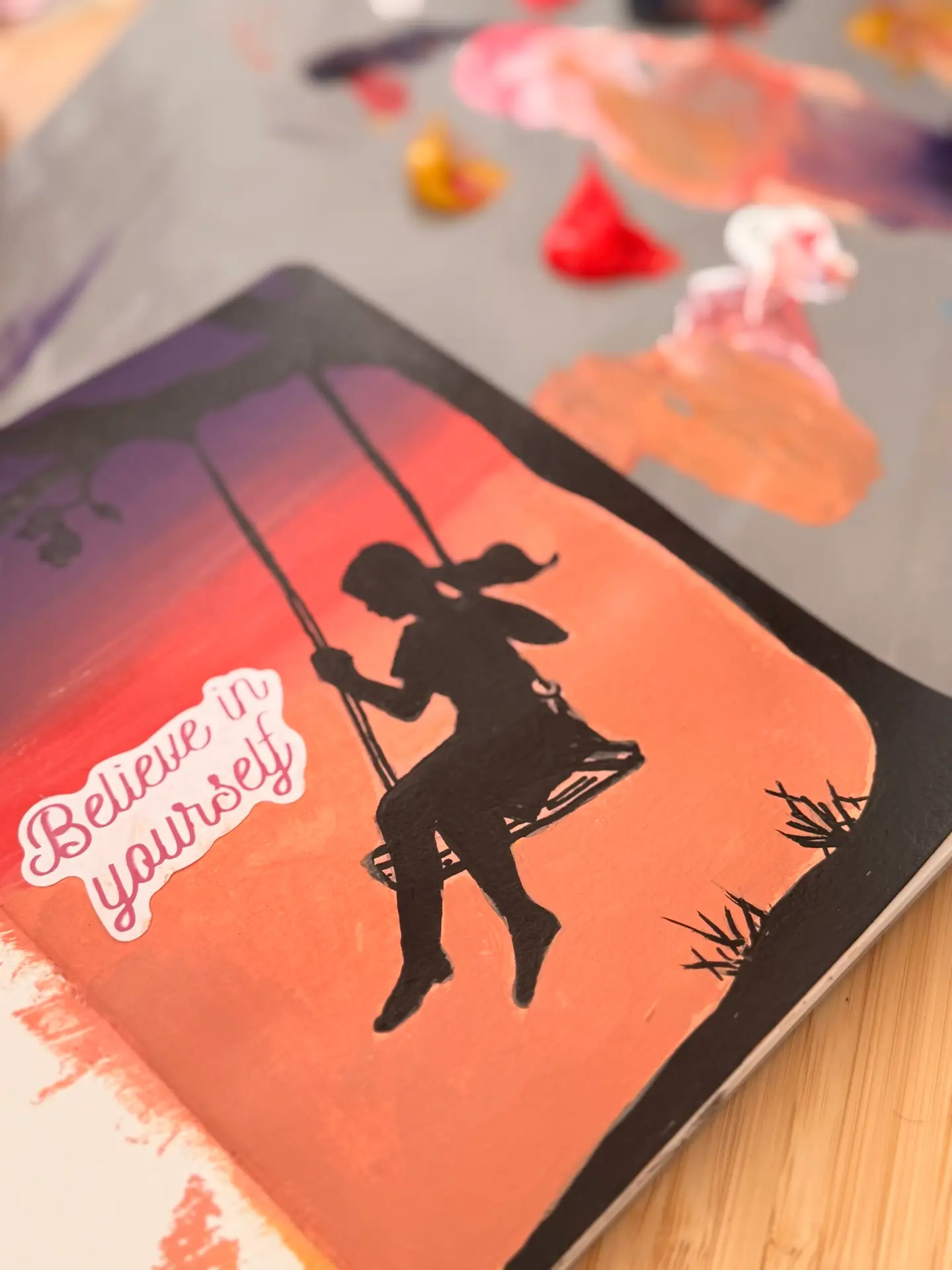art journal of an acrylic painting of a girl in the sunset.