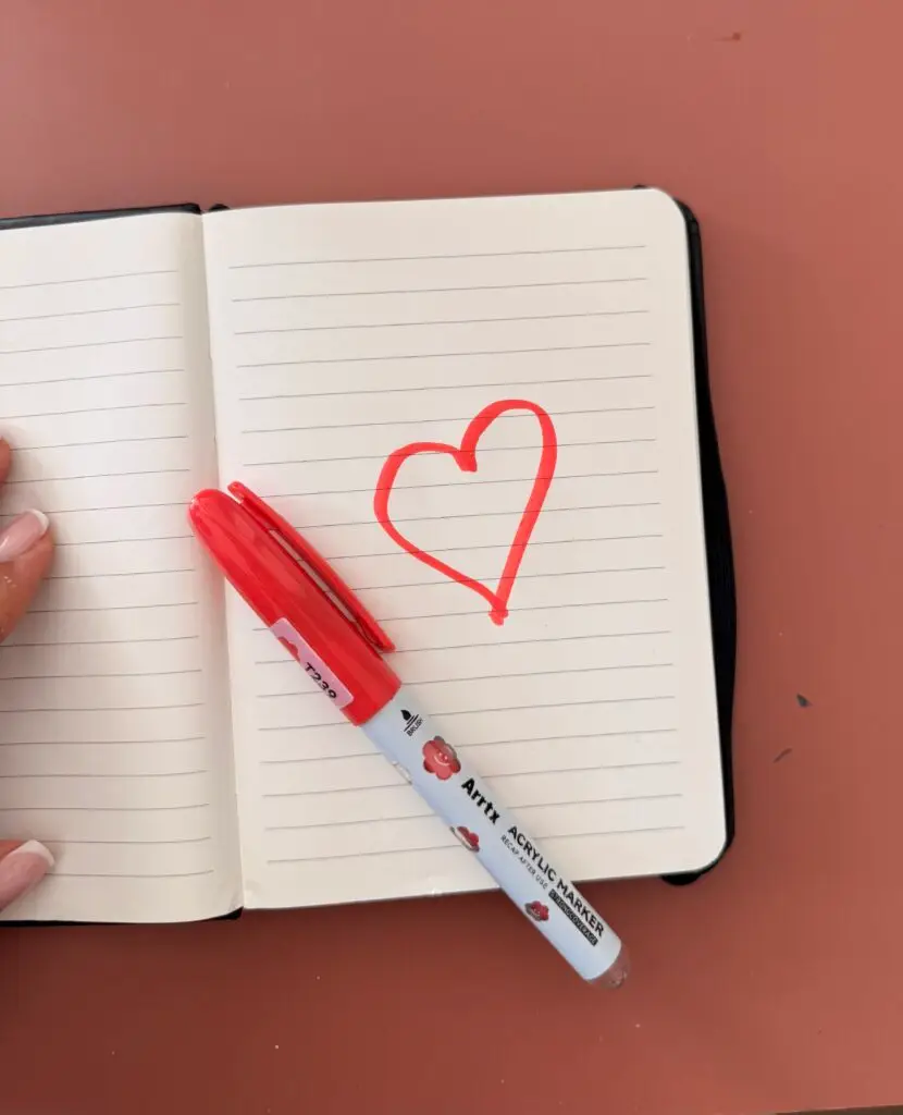 a heart on a regular writing paper
